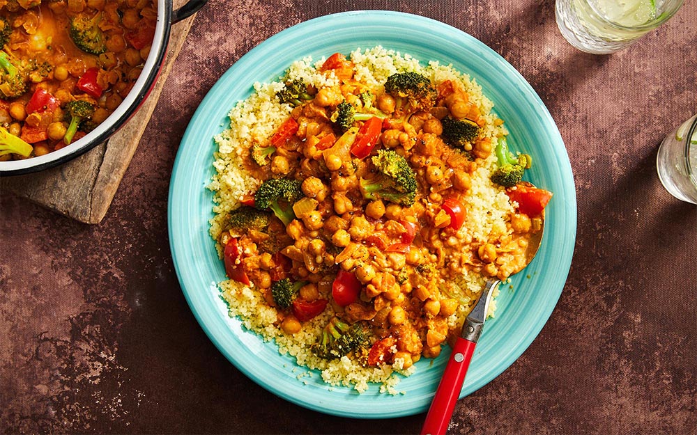 Chickpea Tikka Masala with broccoli, peppers and couscous,