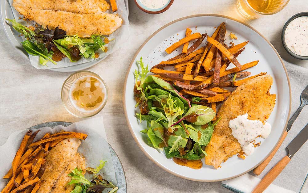 Crispy Baked Fish n’ Chips with sweet potatoes and tartar sauce,