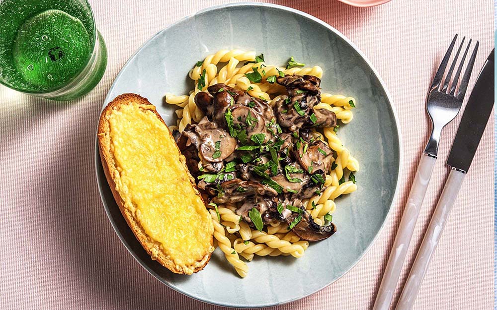 Mushroom Stroganoff with cheesy garlic bread,