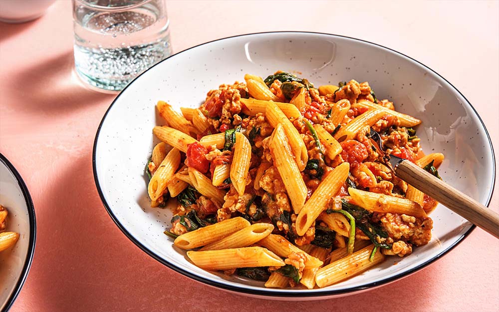 Two Cheese Chicken Pasta with spinach and marinara sauce,