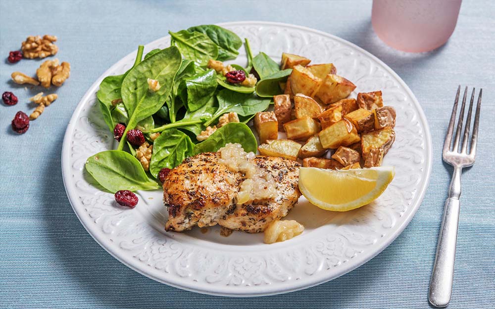 Herbed Roasted Chicken with onion chutney and walnut-cranberry salad,