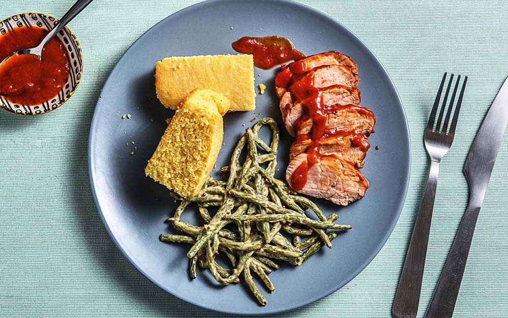 Paprika Glazed Pork with baked green beans and cornbread,