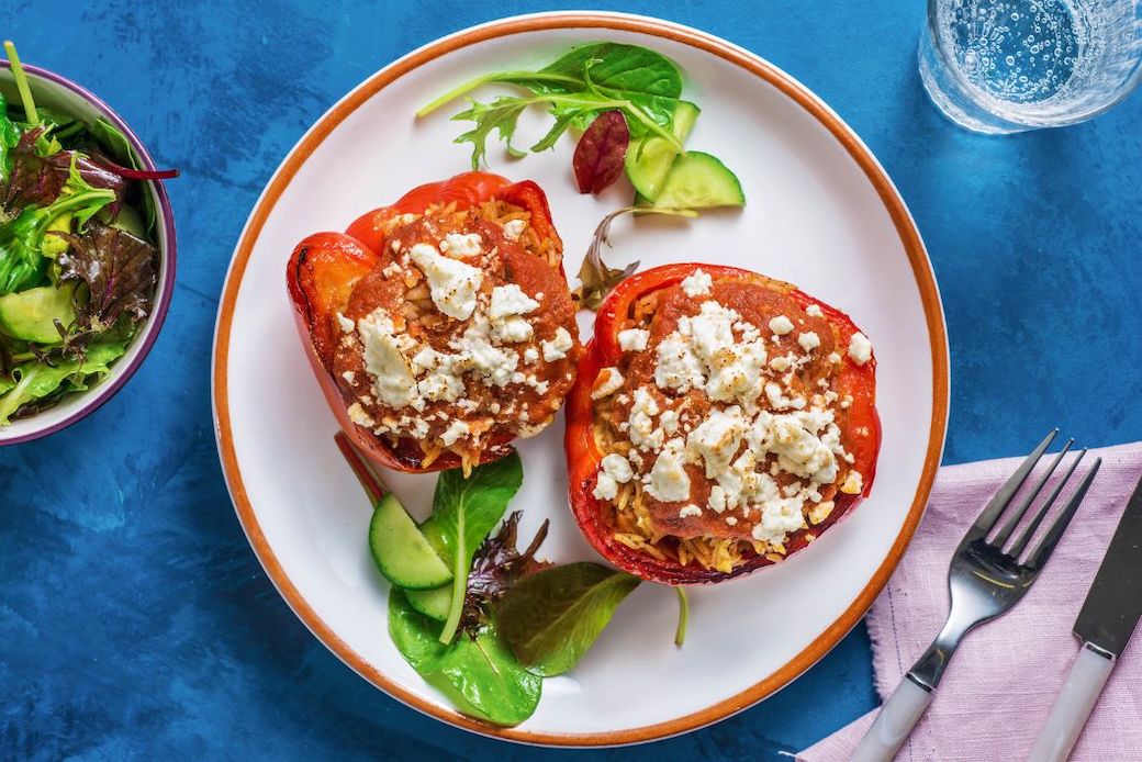 Mediterranean Stuffed Peppers with feta cheese and baby greens salad