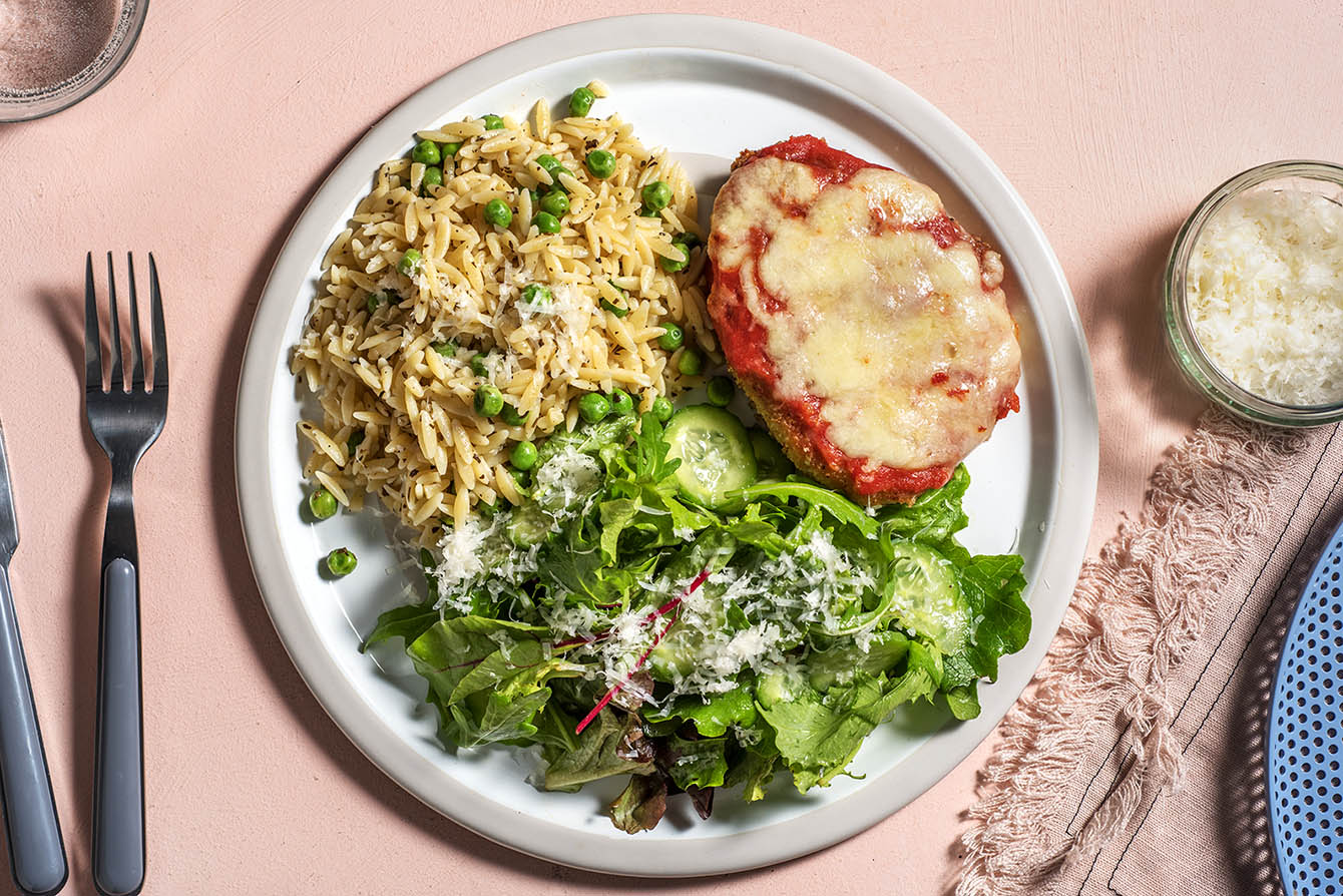 Cheesy Pork Parmesan with a field green salad
