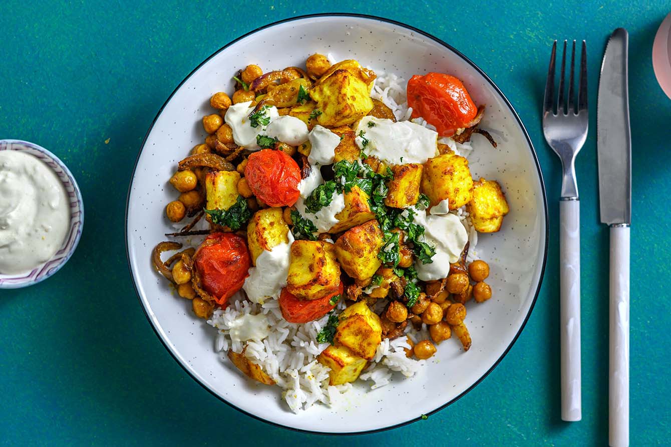 Masala Chickpea & Halloumi Bowl with cilantro chutney and cumin raiita